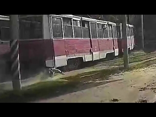 the guy had his leg pinched in a tram and was dragged along the rails © video